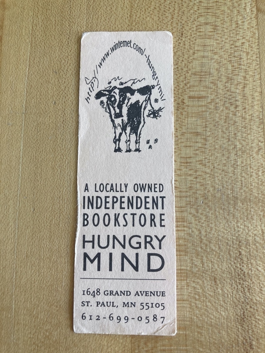 Hungry Mind bookmark with a drawing of a cow