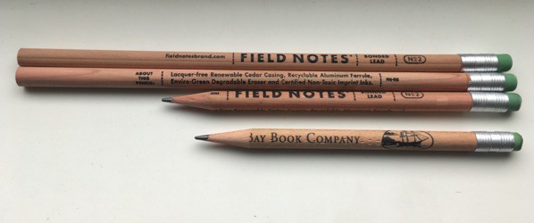 three Field Notes pencils and a friend